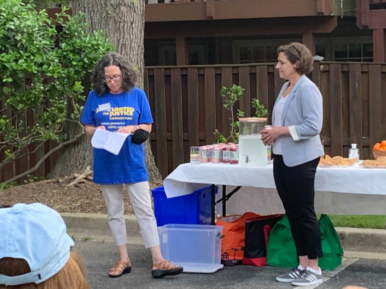 Deedee speaking at a JUFJ Campaign Fund event with Kate Stewart for County Council